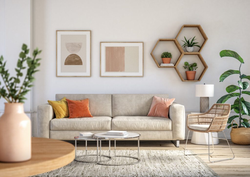 Imagem de uma sala decorada com móveis beges, móveis de madeira e plantas